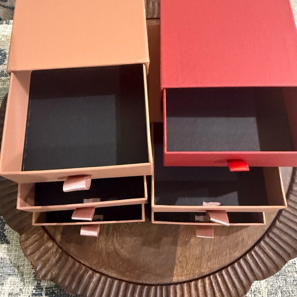 Set of Pink and Red Storage Boxes
